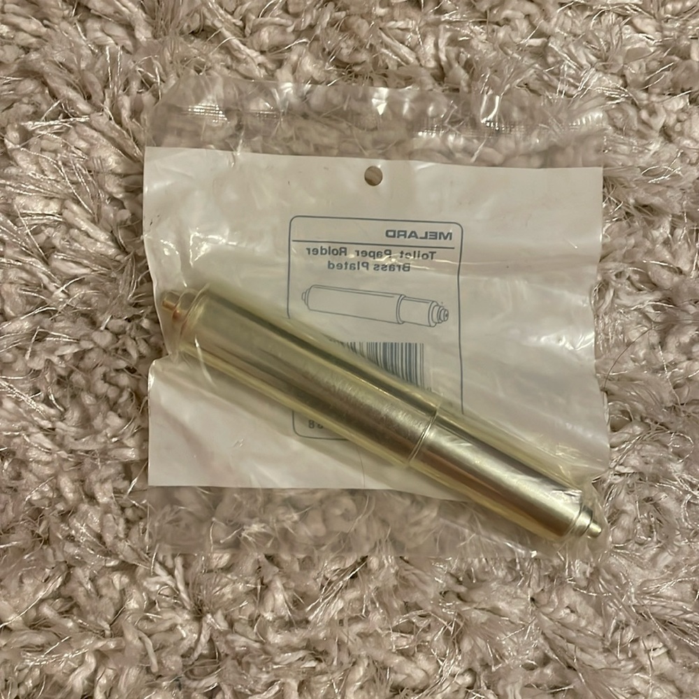 Toilet paper spring roller